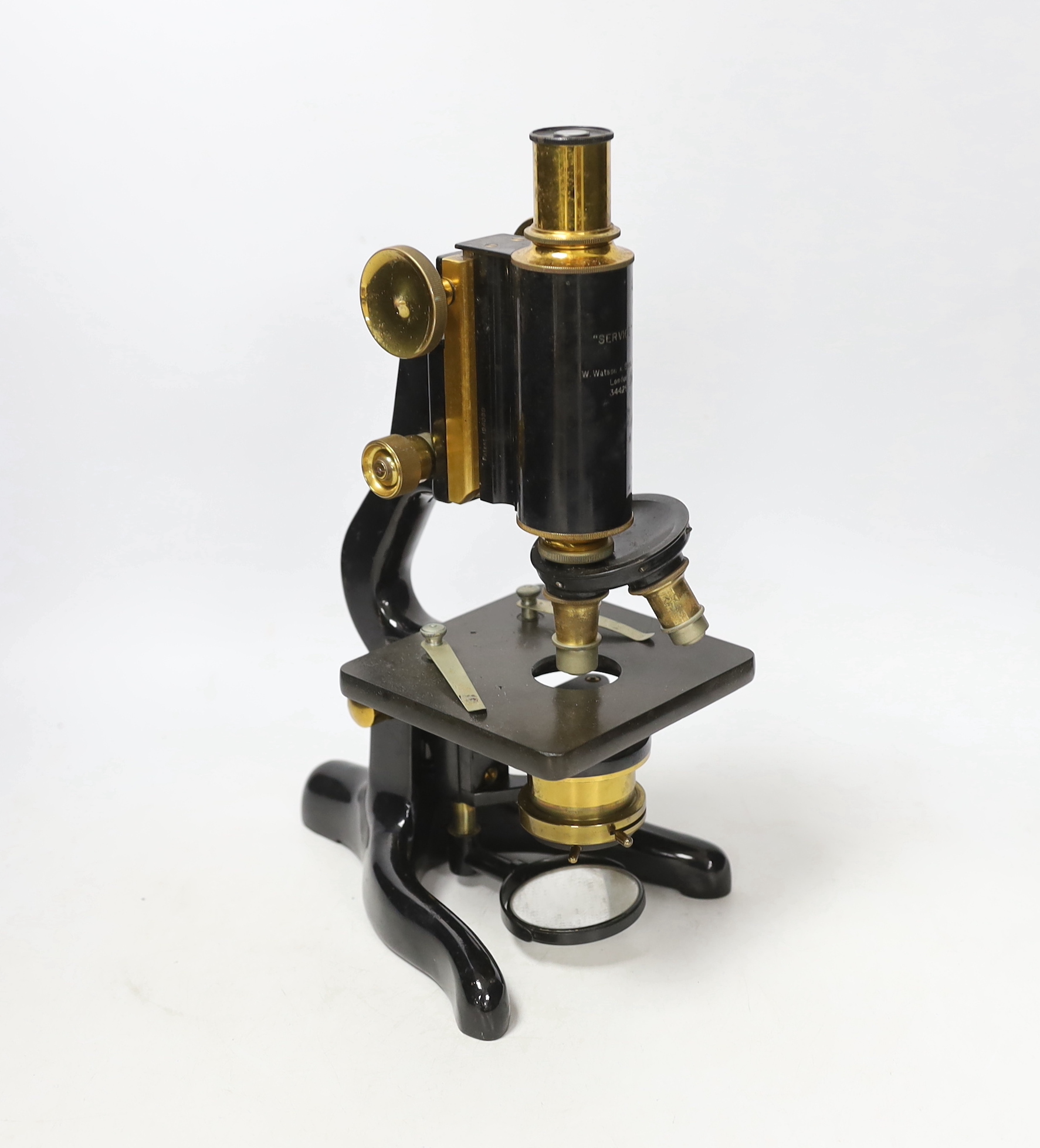 A mahogany cased 'service' microscope, marked W. Watson & Son Ltd., London and numbered 34429, with alternative lens in fitted compartments, case 34cm high